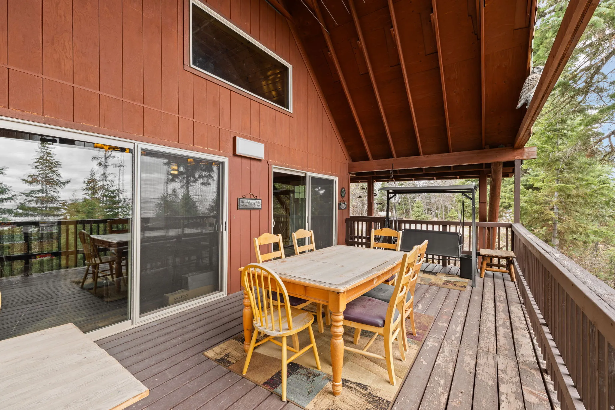 Cabin 2 - East; Wooden terrace with outdoor dining area