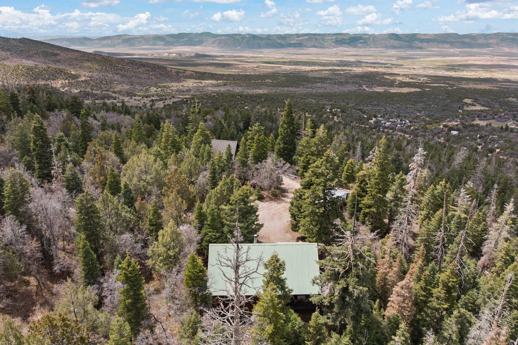Cabin 2 - East; Bird's eye view of a mountain backdrop