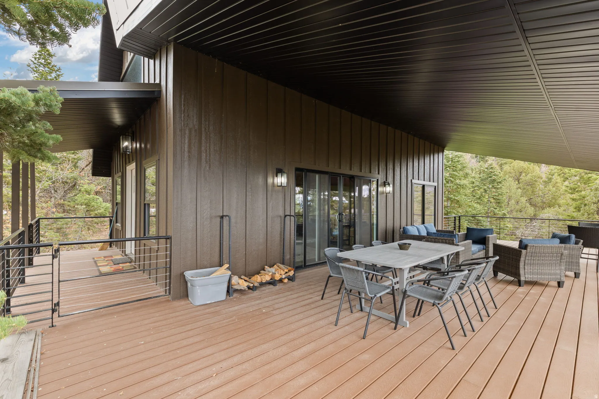 Cabin 1 - West; Wooden terrace with outdoor lounge area