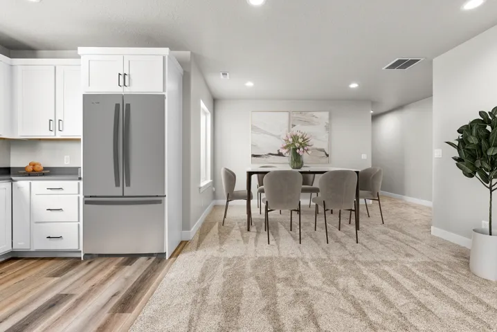 Dining room featuring recessed lighting and light wood-style floors
