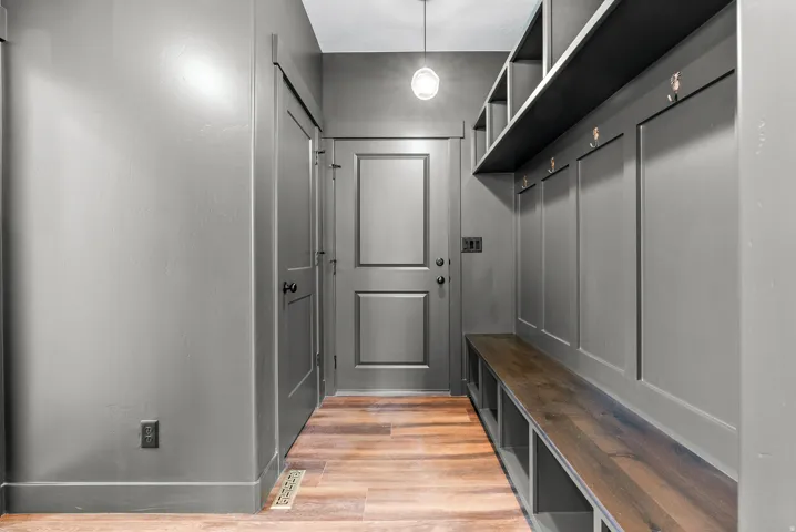 Mudroom featuring light wood finished floors