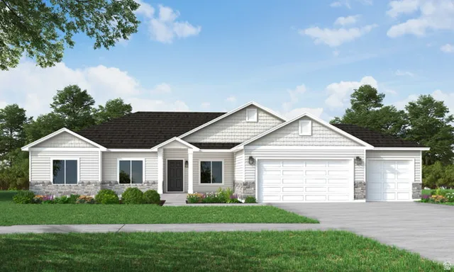View of front of house with stone siding, a front yard, an attached garage, and driveway
