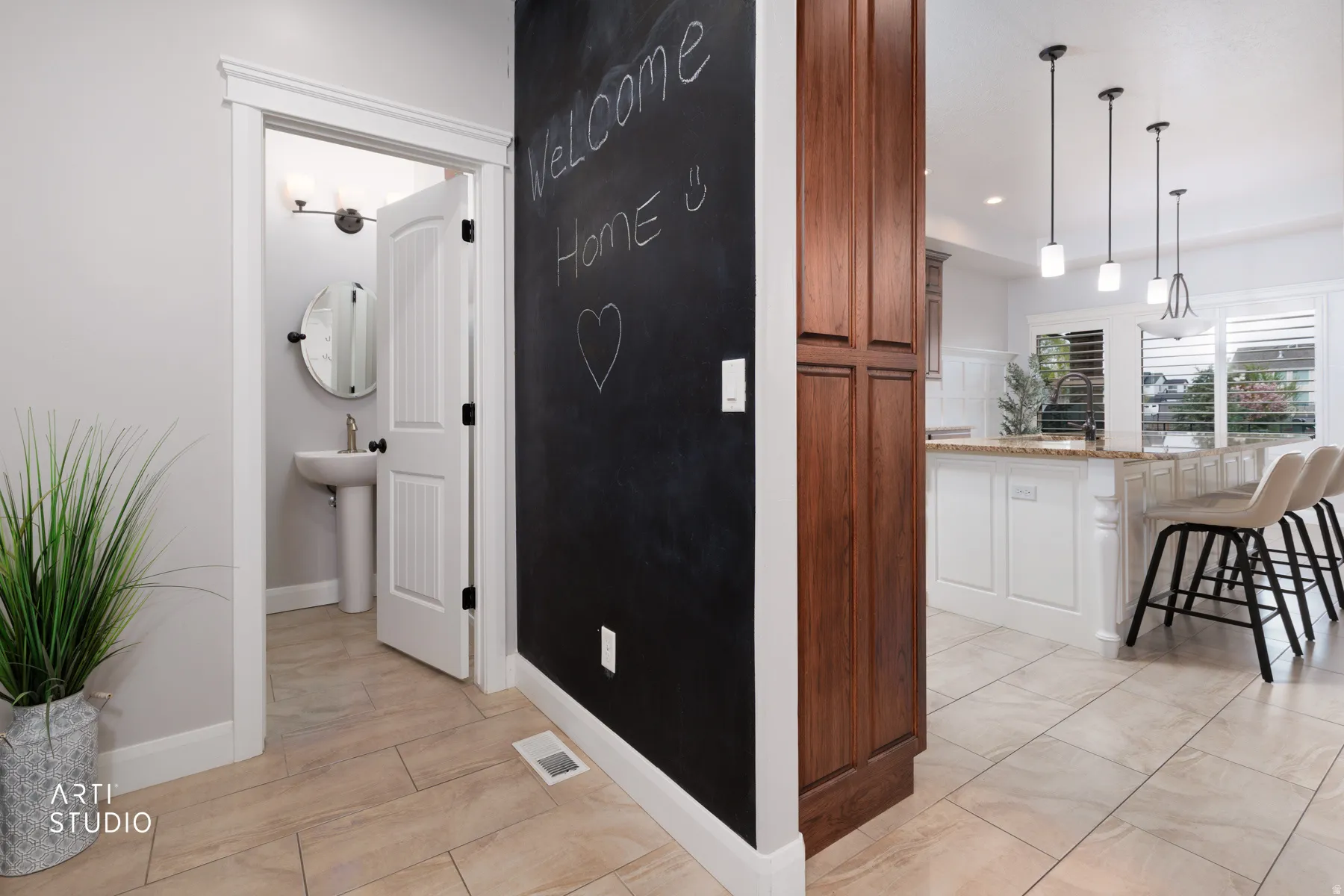 Hall with baseboards and recessed lighting