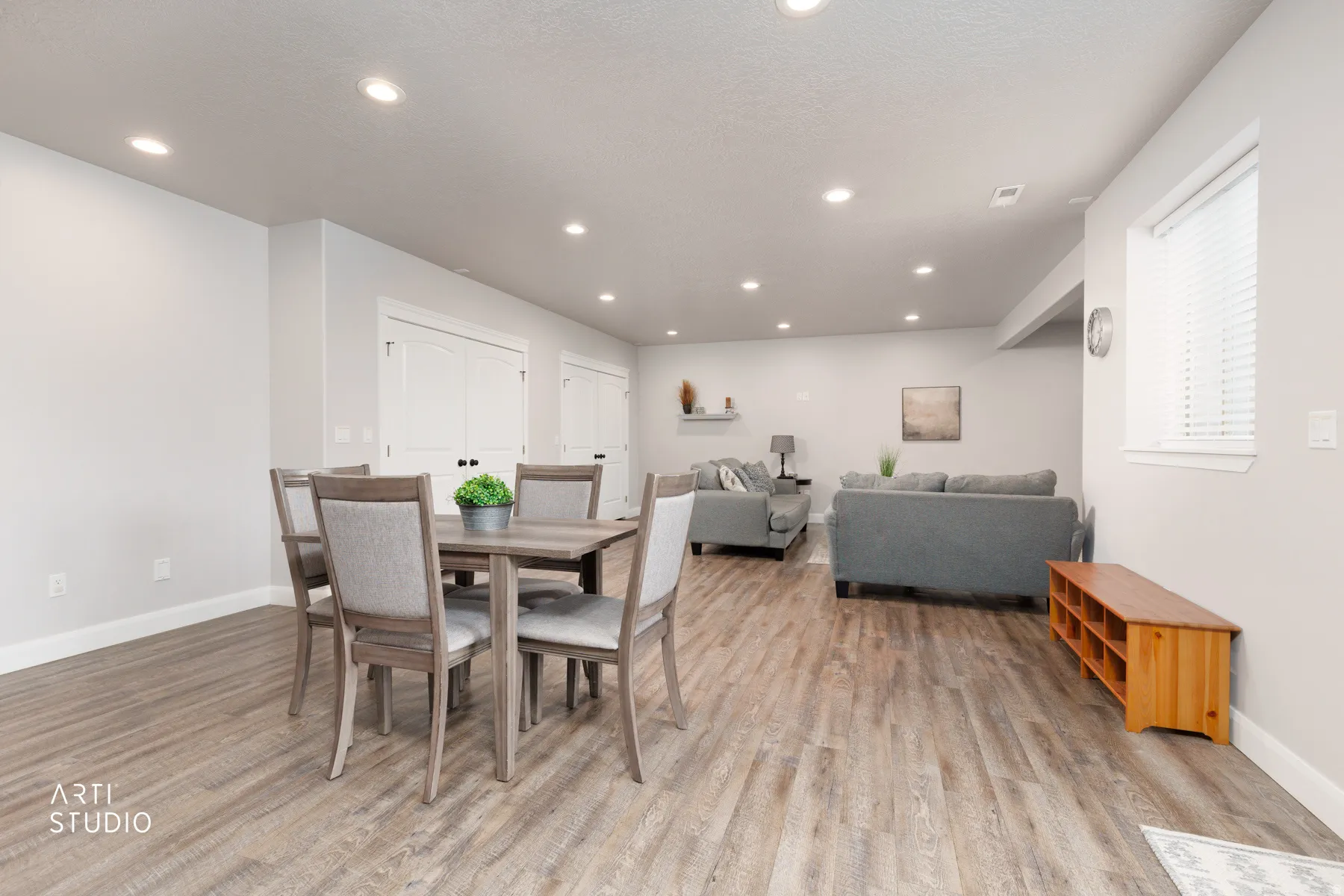 Dining room with recessed lighting and light wood-style floors