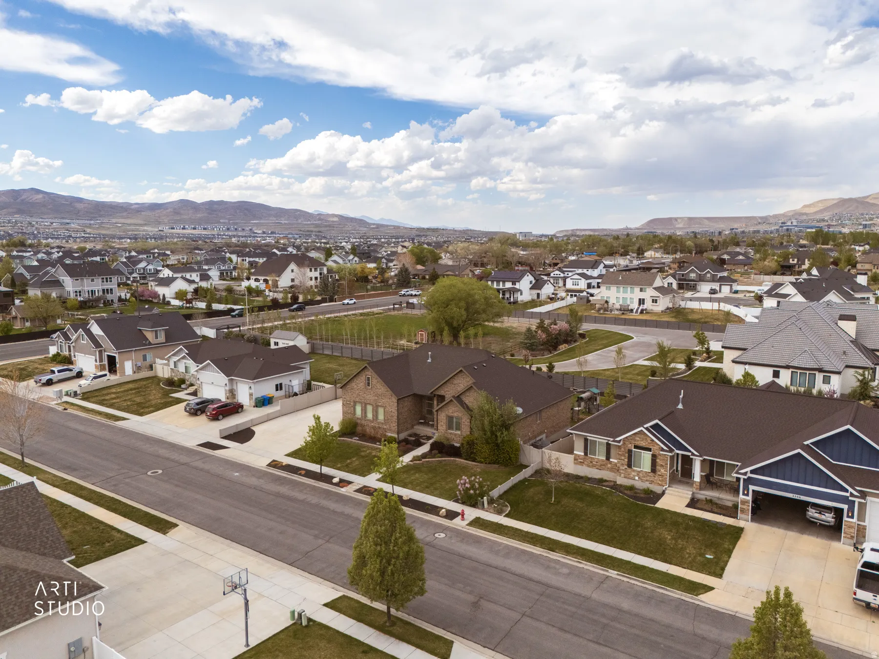 Aerial view of residential area with a mountainous background
