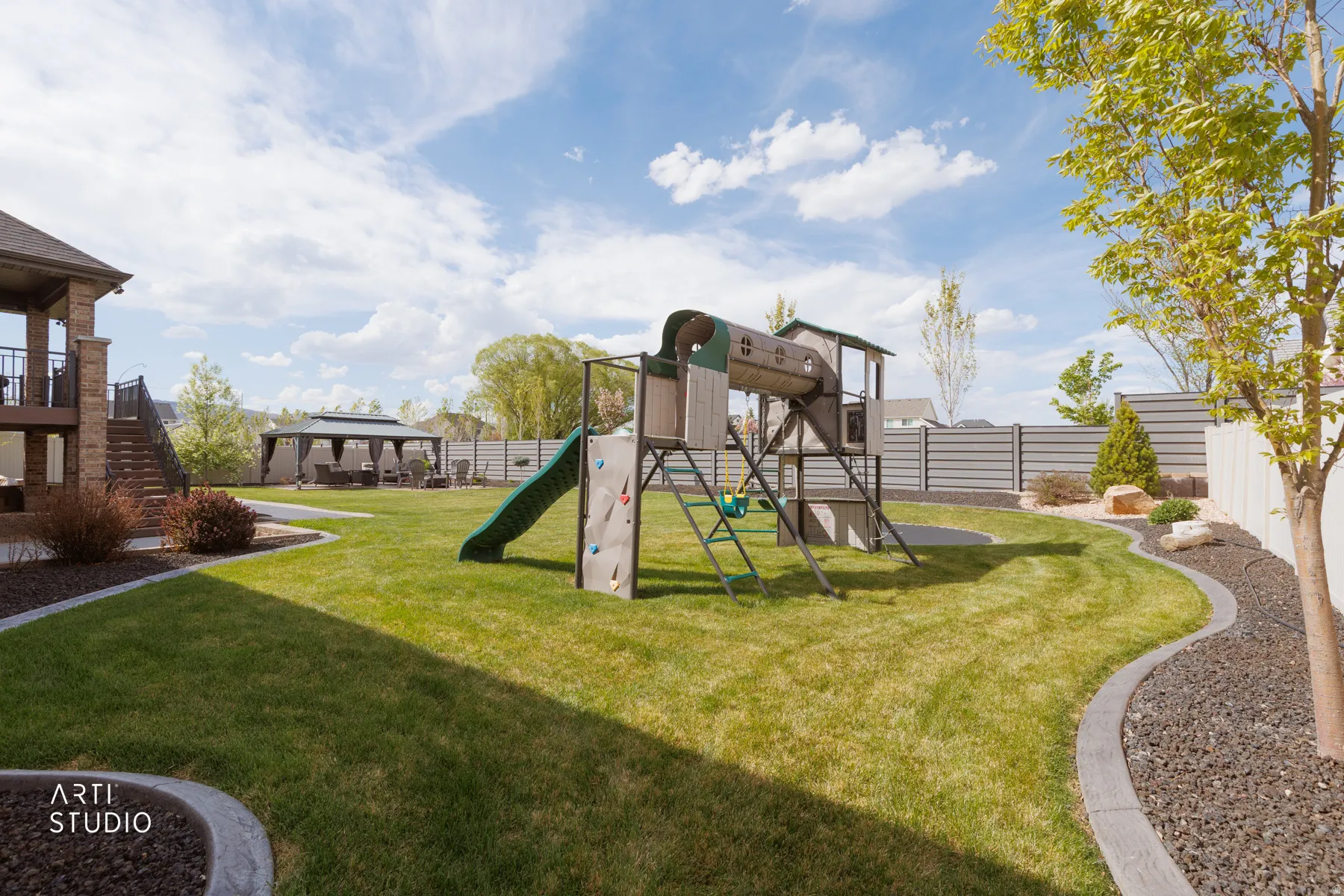 View of jungle gym featuring stairs