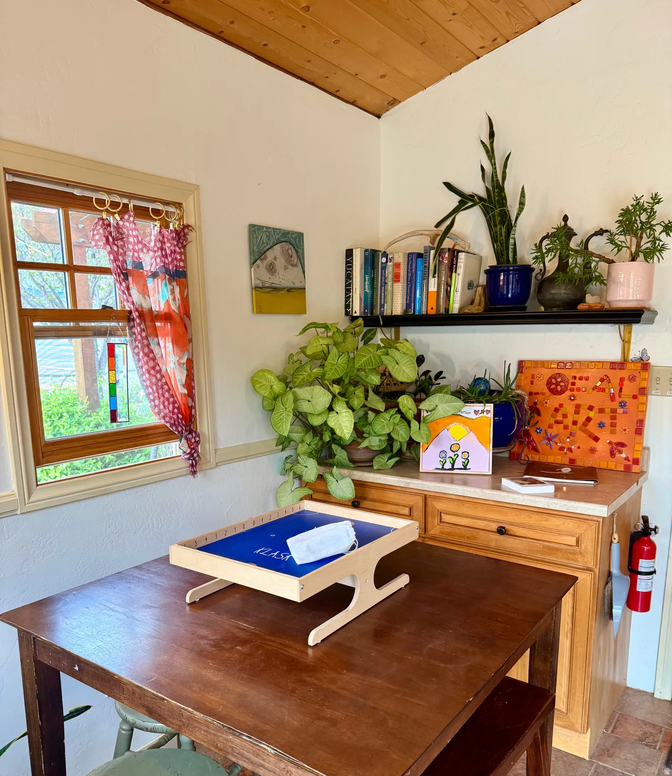 Dining room with wooden ceiling