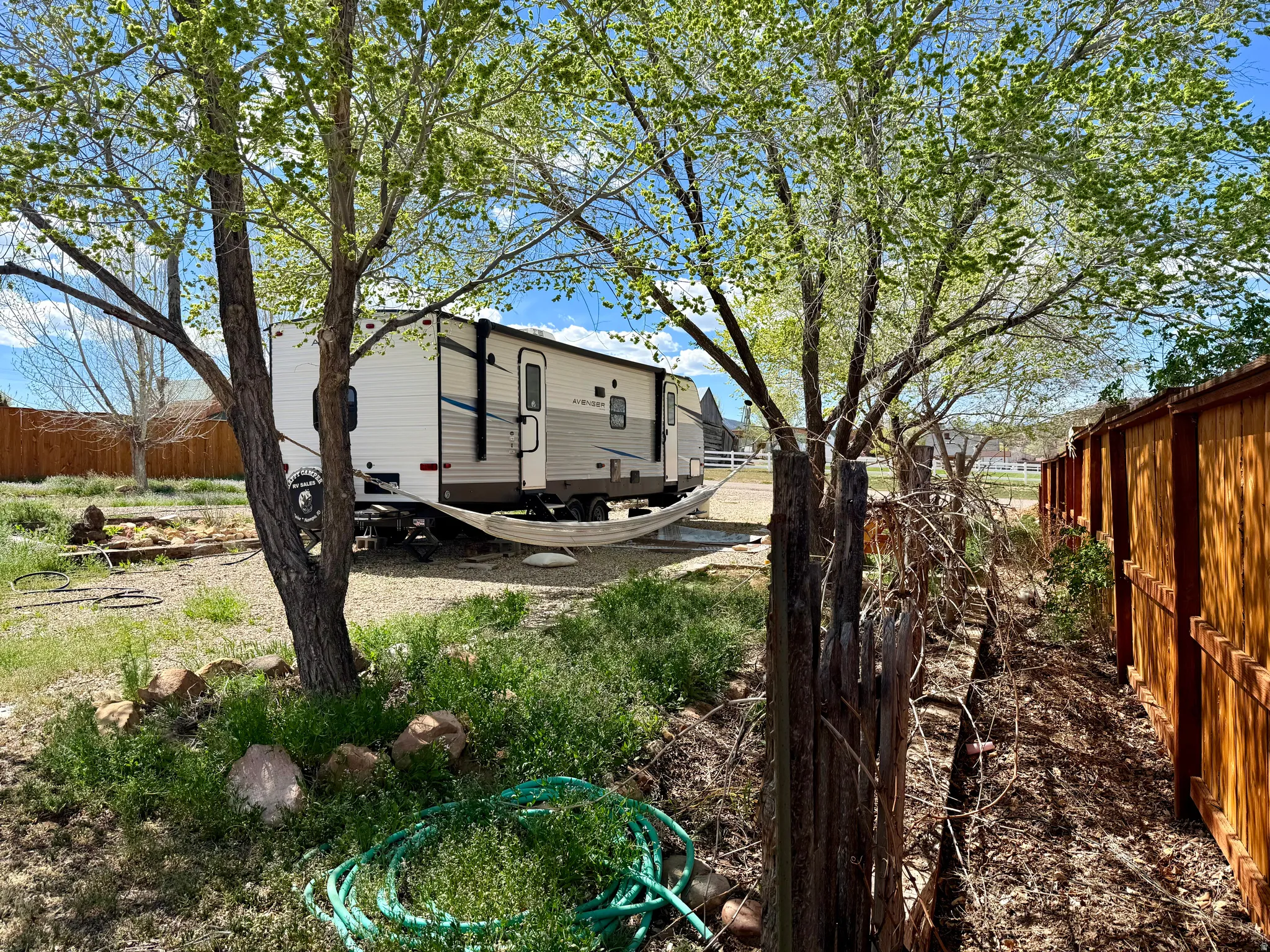 View of fenced backyard