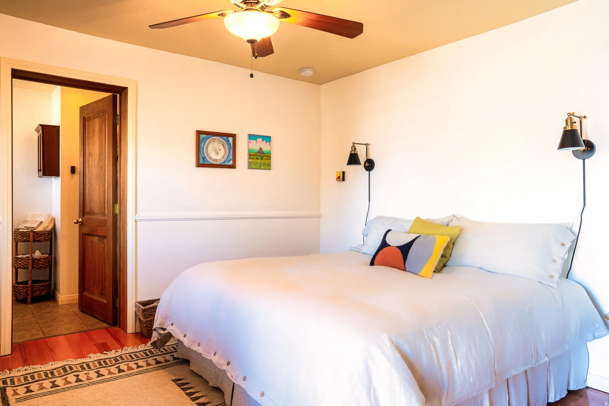 Bedroom with light wood-type flooring and ceiling fan