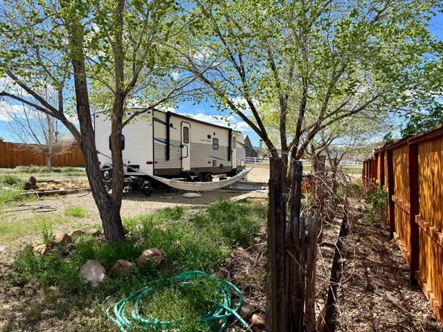 View of fenced backyard