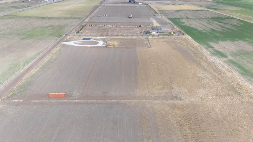 Overview of rural landscape featuring extensive farmland