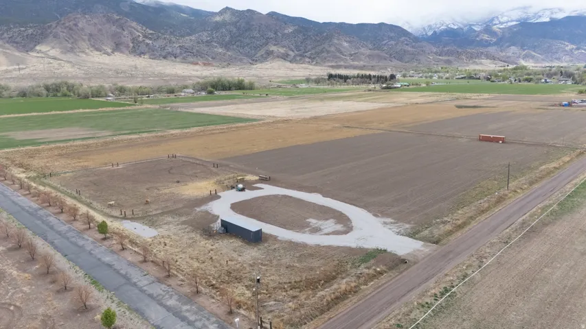 Overview of rural landscape with a mountain backdrop
