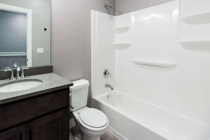 Photo is of previously built home by builder. Some features may be optional. Consult with sales manager for more info.