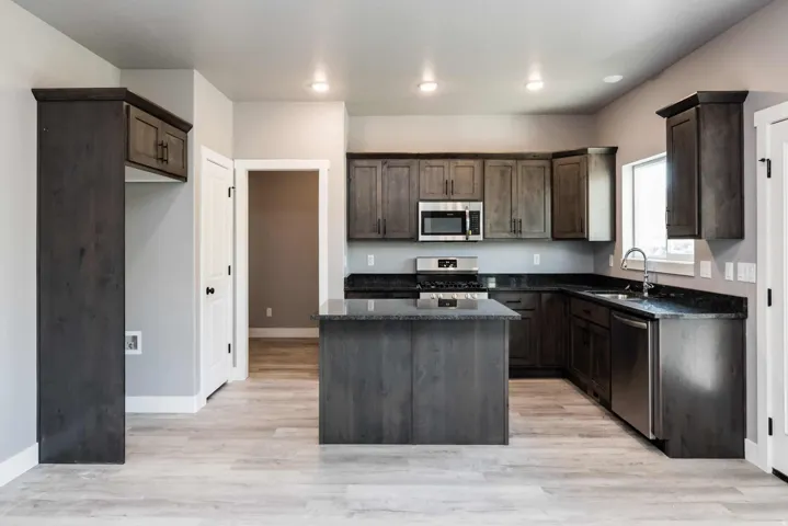 Photo is of previously built home by builder. Some features may be optional. Consult with sales manager for more info.