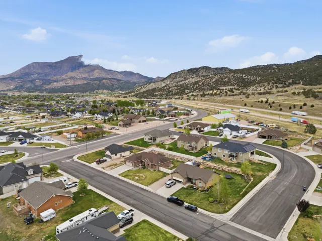 Aerial view of residential area featuring mountains
