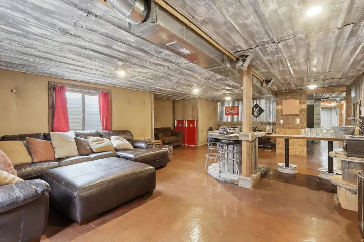 Living room featuring concrete floors