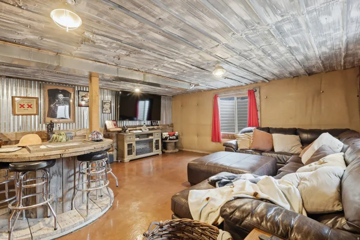 Living room with finished concrete floors