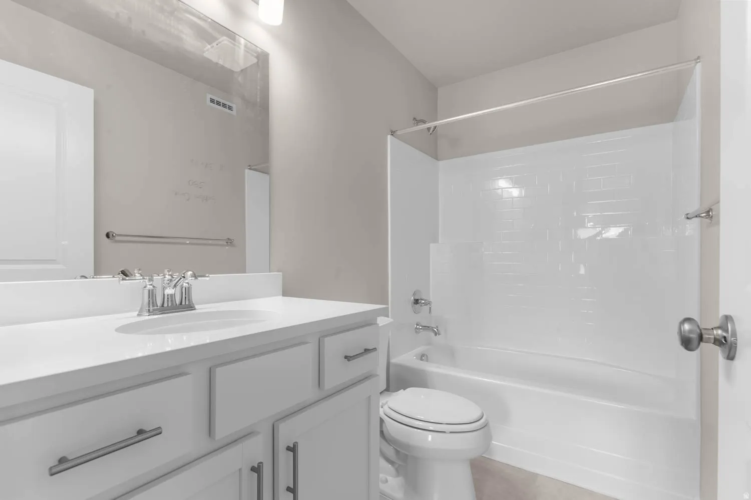 Bathroom with vanity and shower / bathtub combination