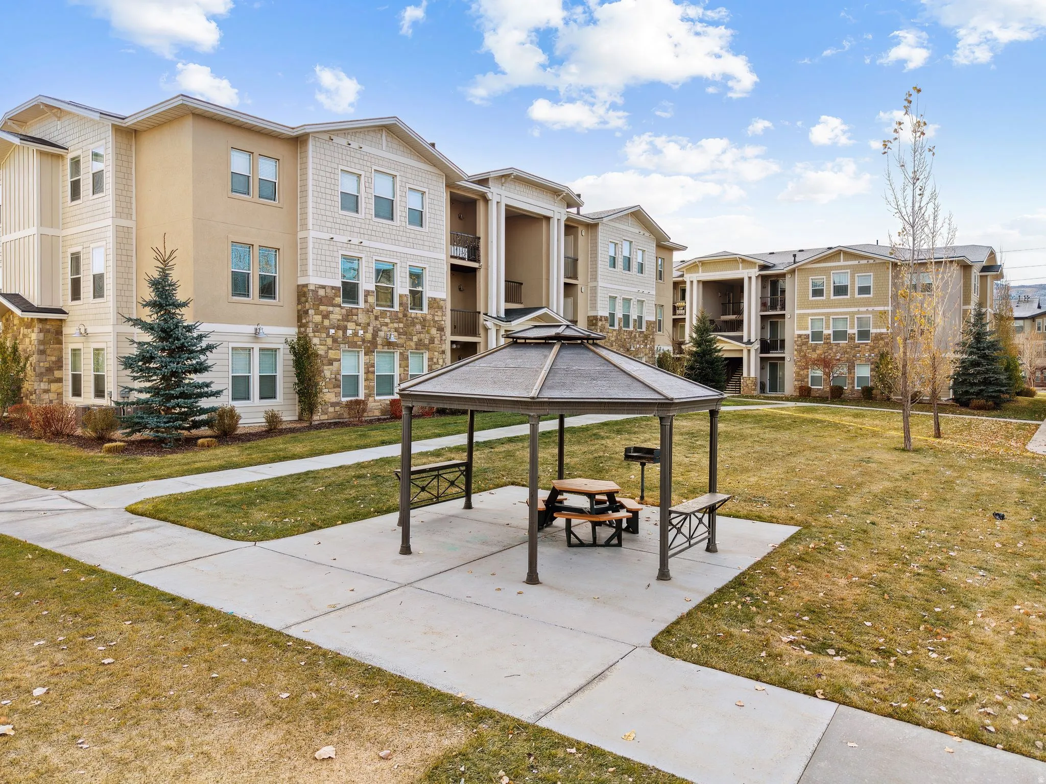 View of community with a patio and a gazebo