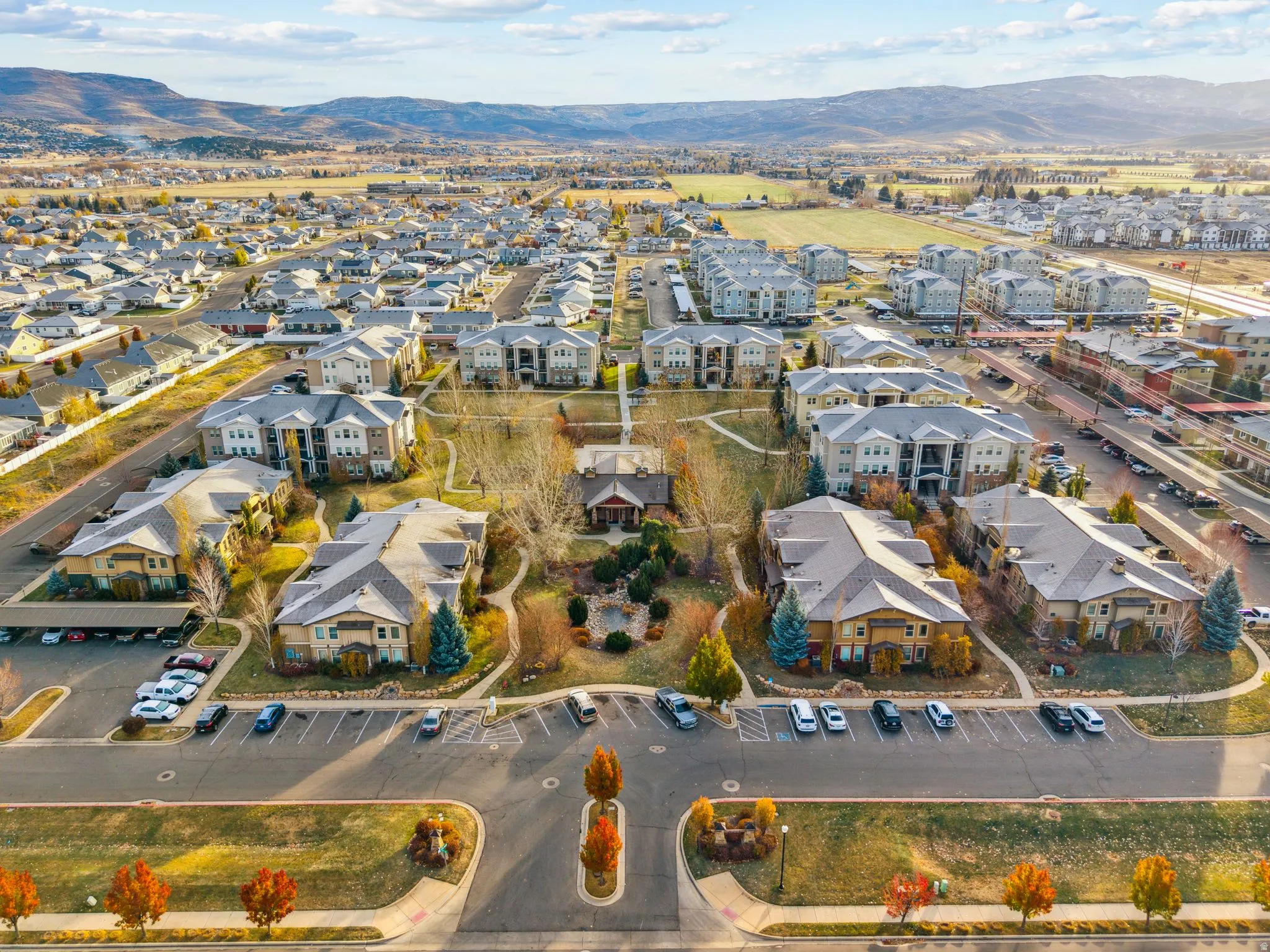 Aerial view of property and surrounding area with mountains