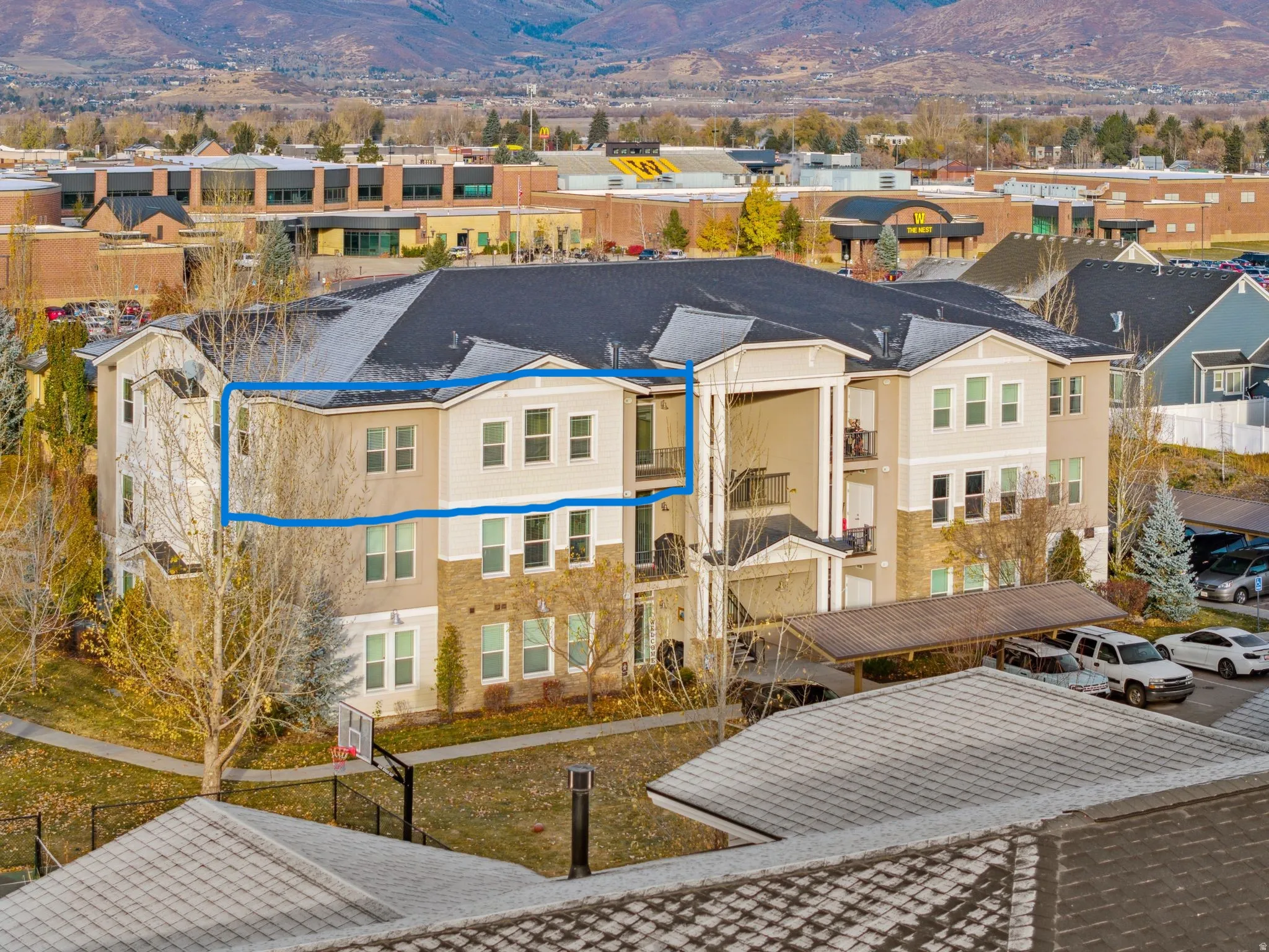 View of front of property featuring a mountain view and a residential view
