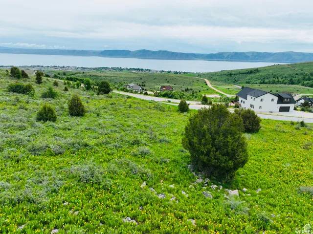 Mountain view featuring a nearby body of water