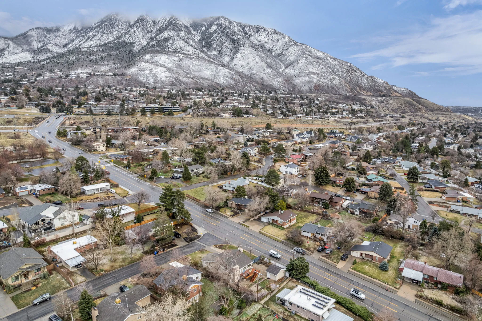 Aerial view of residential area with mountains