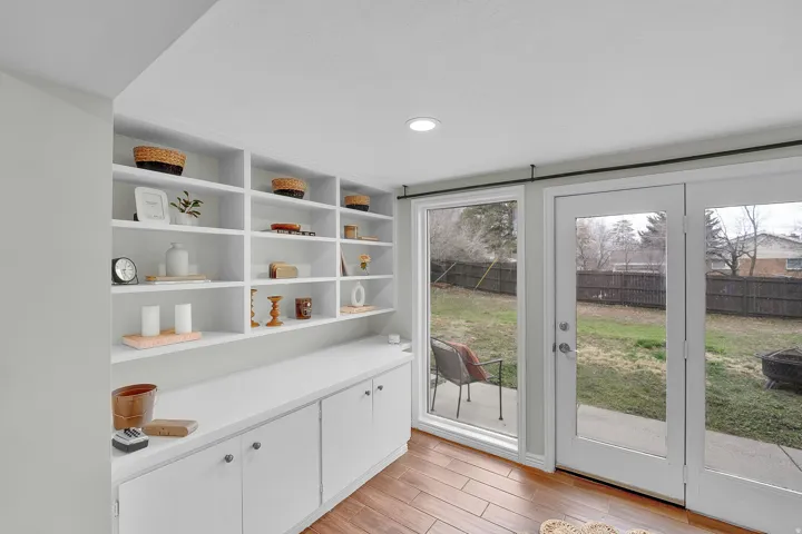 Doorway featuring wood finished floors