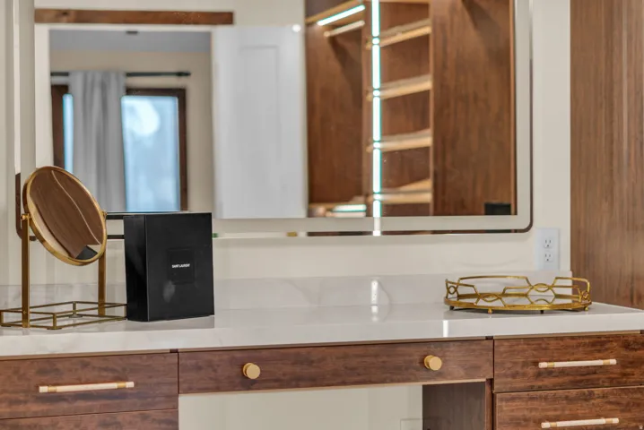 Kitchen view of light stone countertops