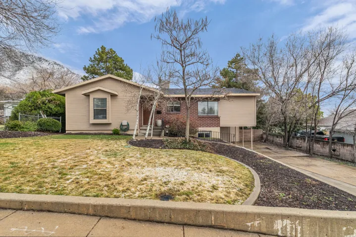 Ranch-style house with a patio