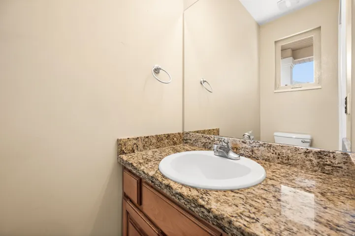 Bathroom with vanity and toilet