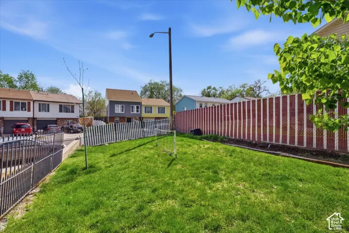 View of yard featuring a residential view