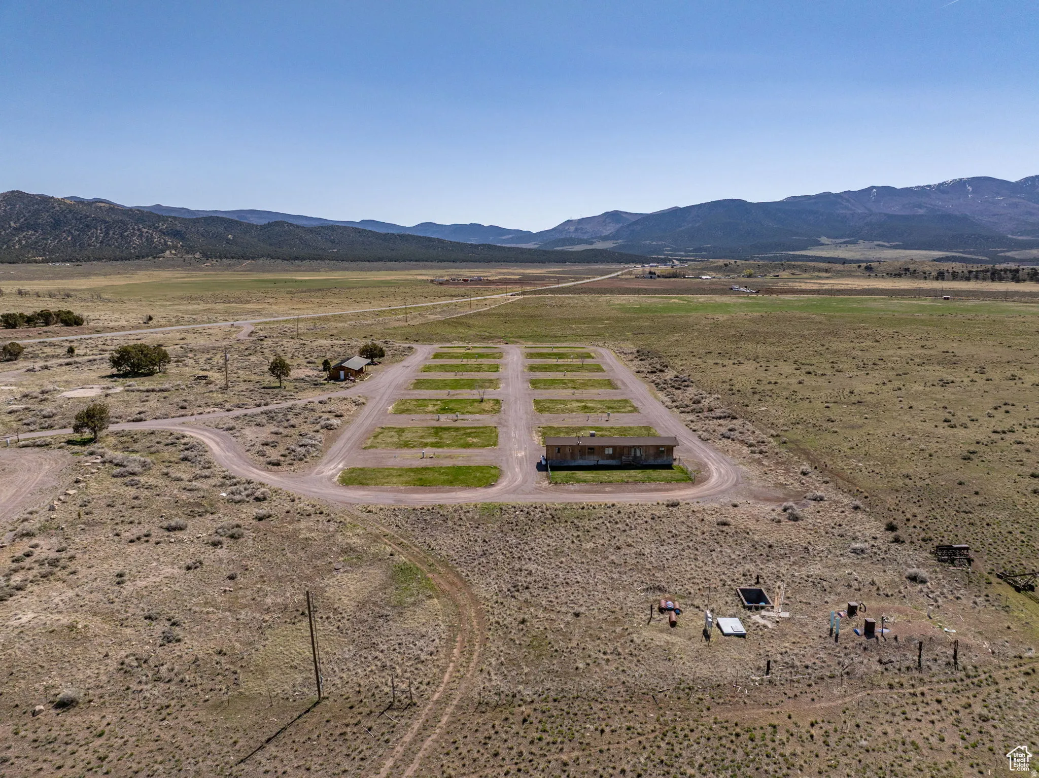 Aerial view of sparsely populated area featuring a mountain backdrop