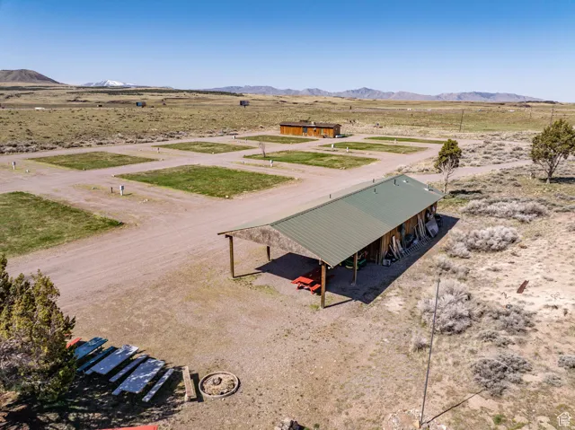 Surrounding community with a rural view, a mountain view, and a desert view