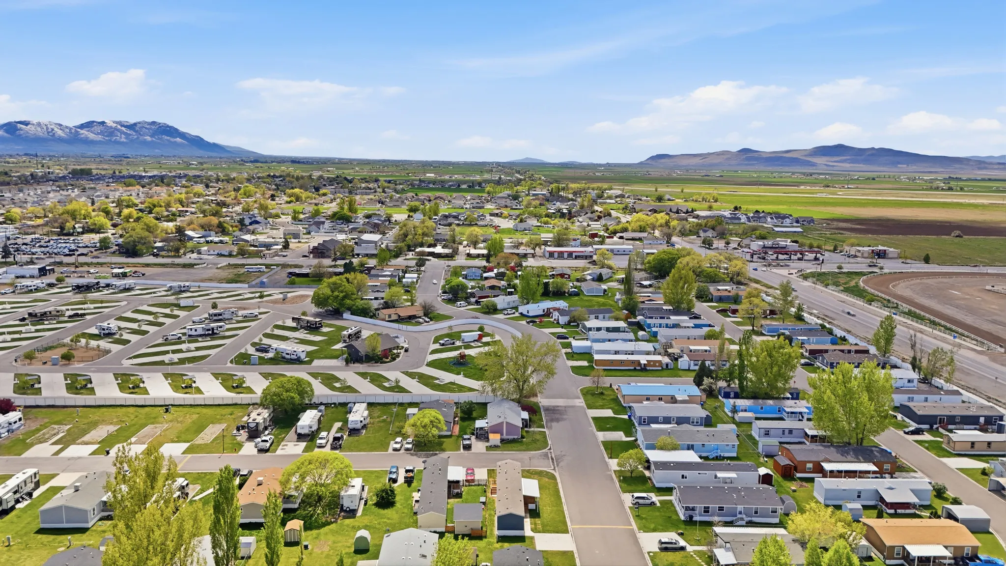 Aerial view of residential area featuring mountains