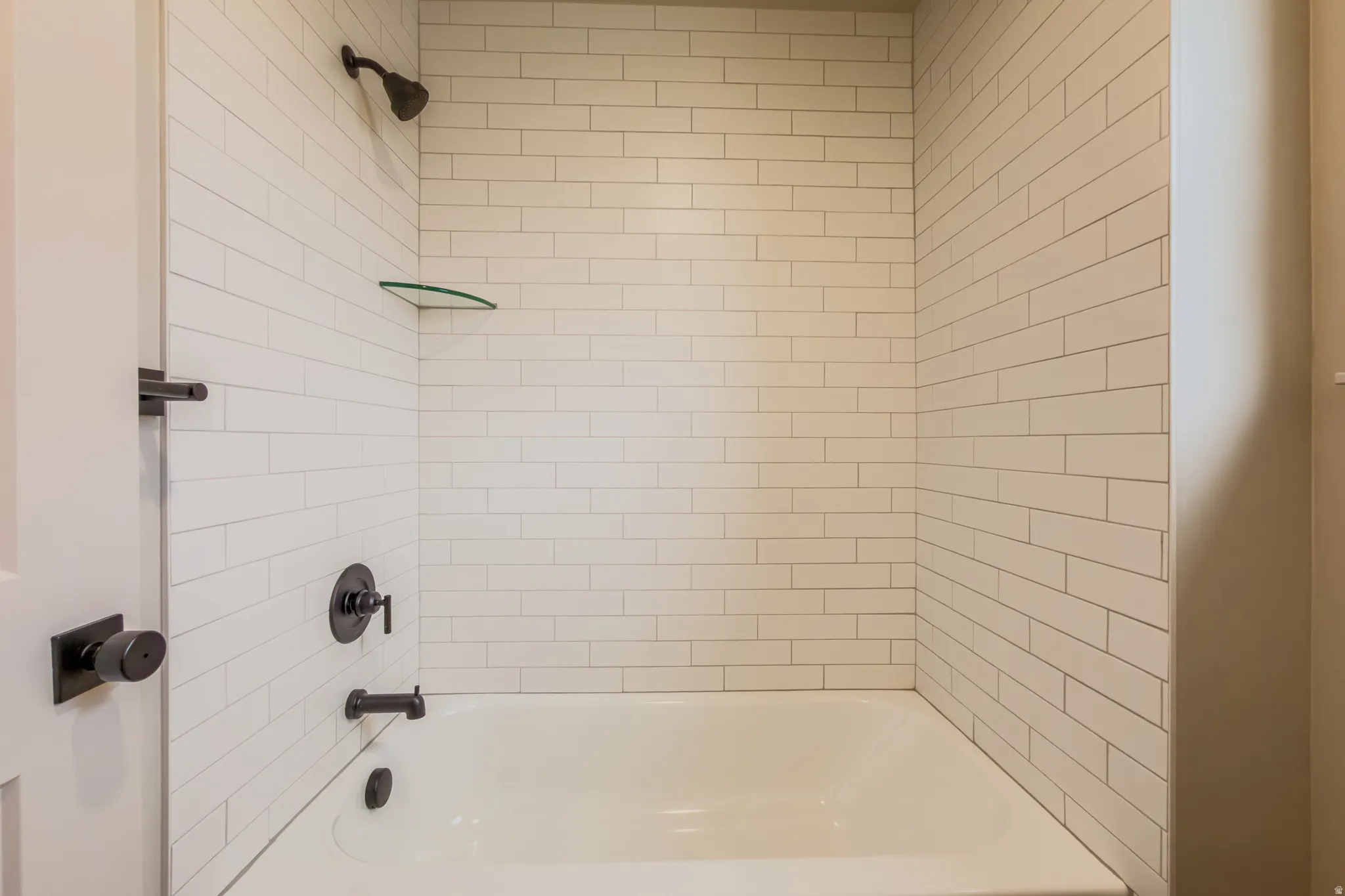 Full bath featuring  shower combination