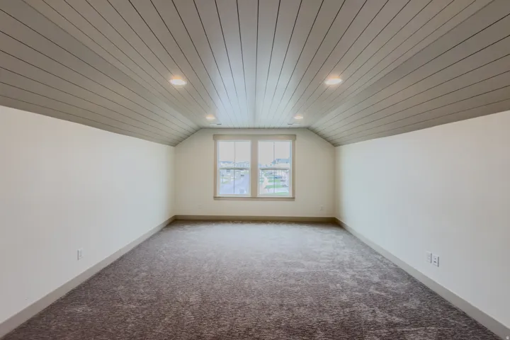 Bonus room with wooden ceiling, carpet flooring, and recessed lighting