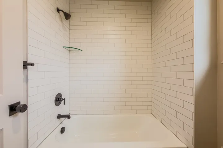 Full bath featuring  shower combination