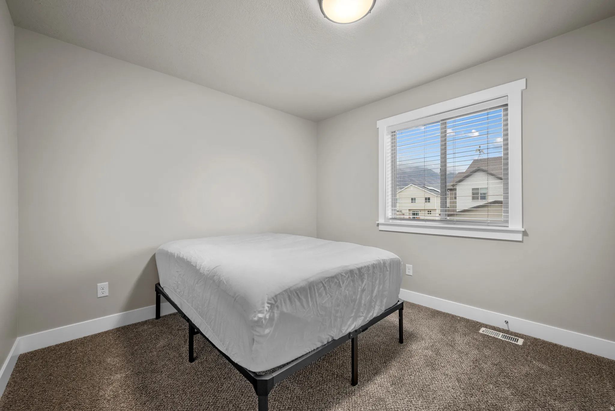 Bedroom featuring carpet floors