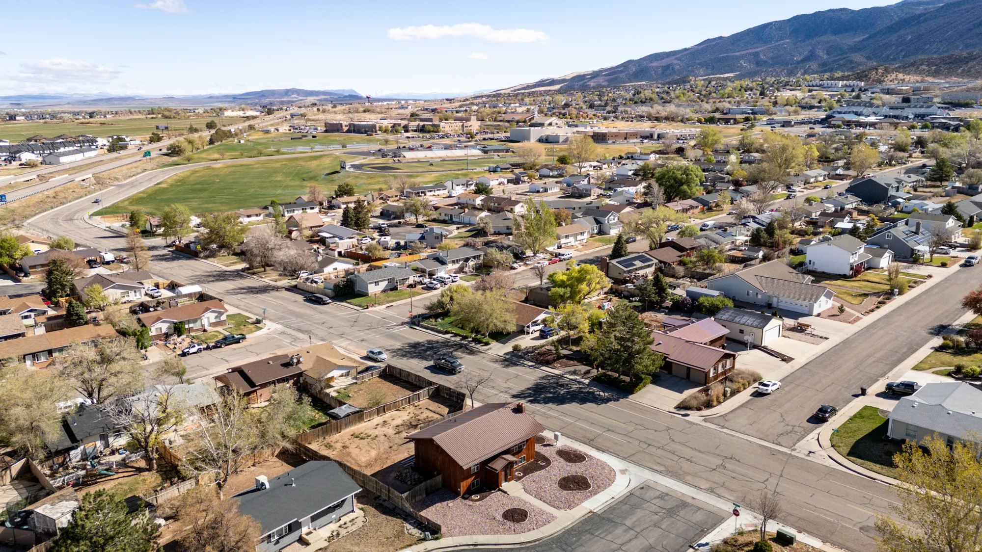 Aerial view of residential area with a mountainous background