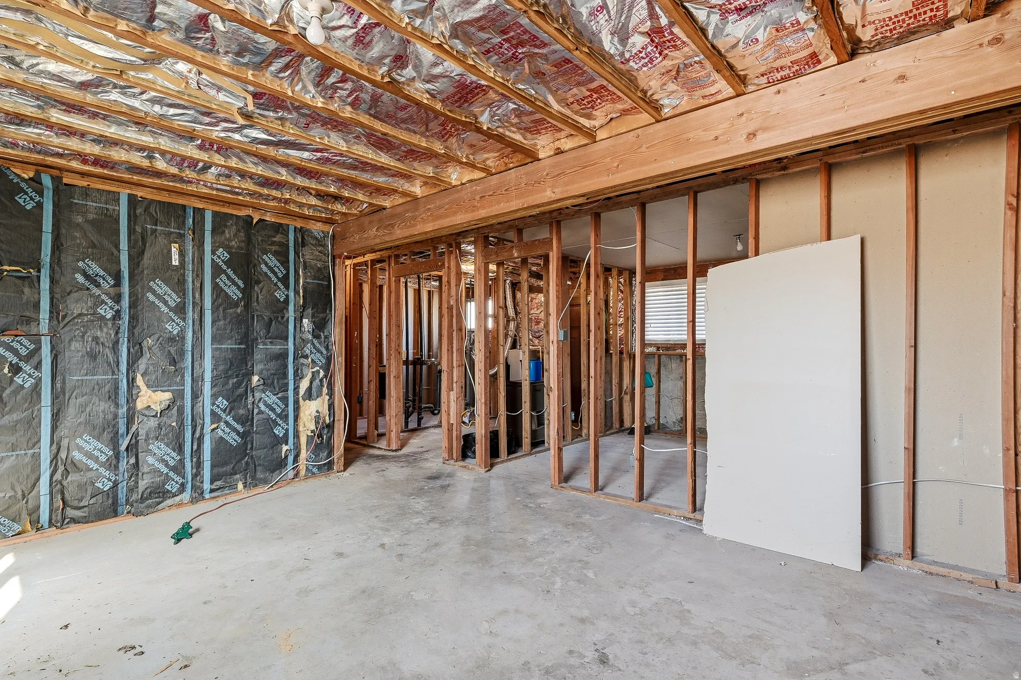 Miscellaneous room featuring concrete flooring
