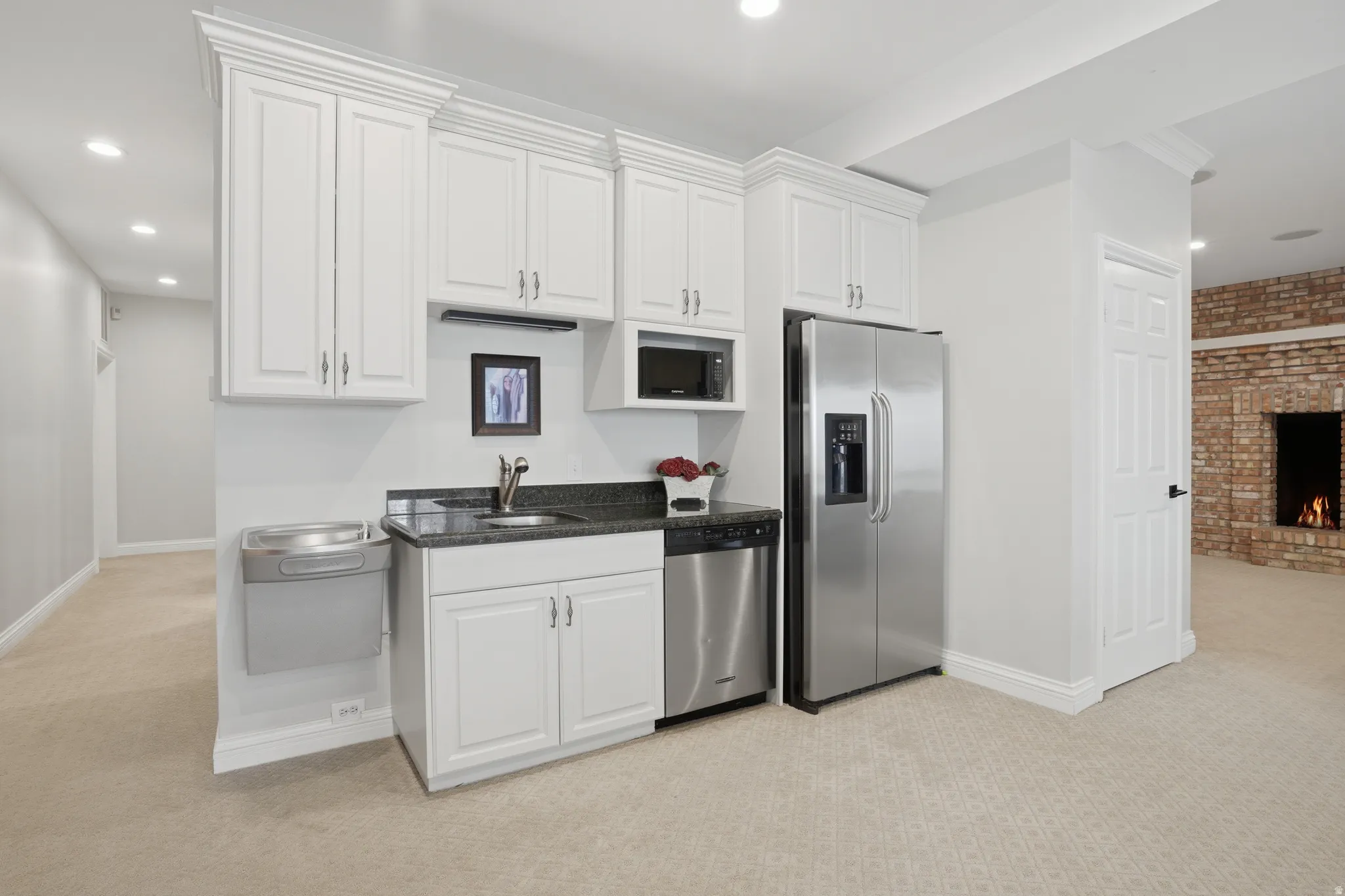 Lower level kitchenette with drinking fountain