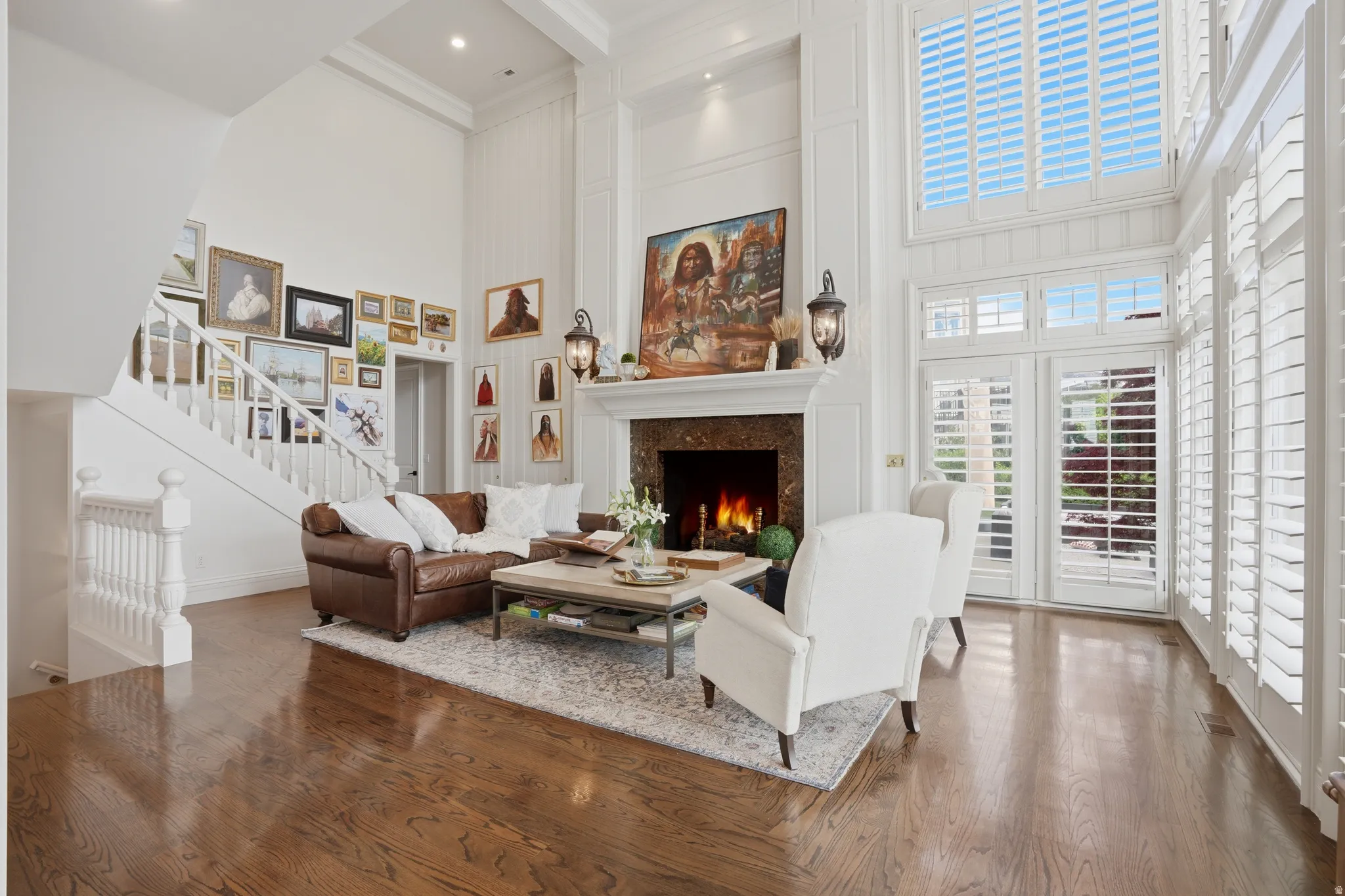 Great room/Family room with two-story windows and views