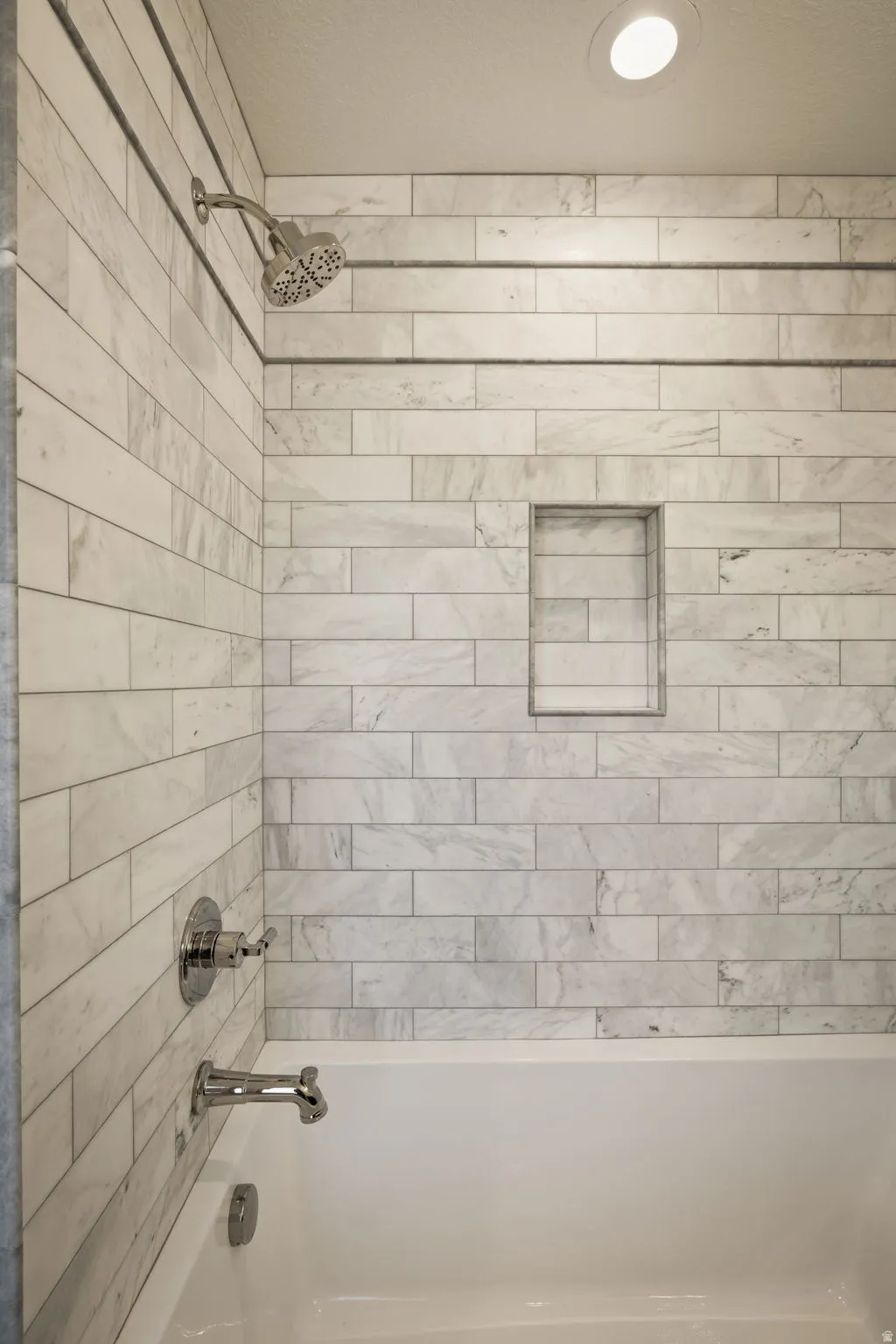 Photos of an exterior unit with the same finishes -Bathroom with bathing tub / shower combination