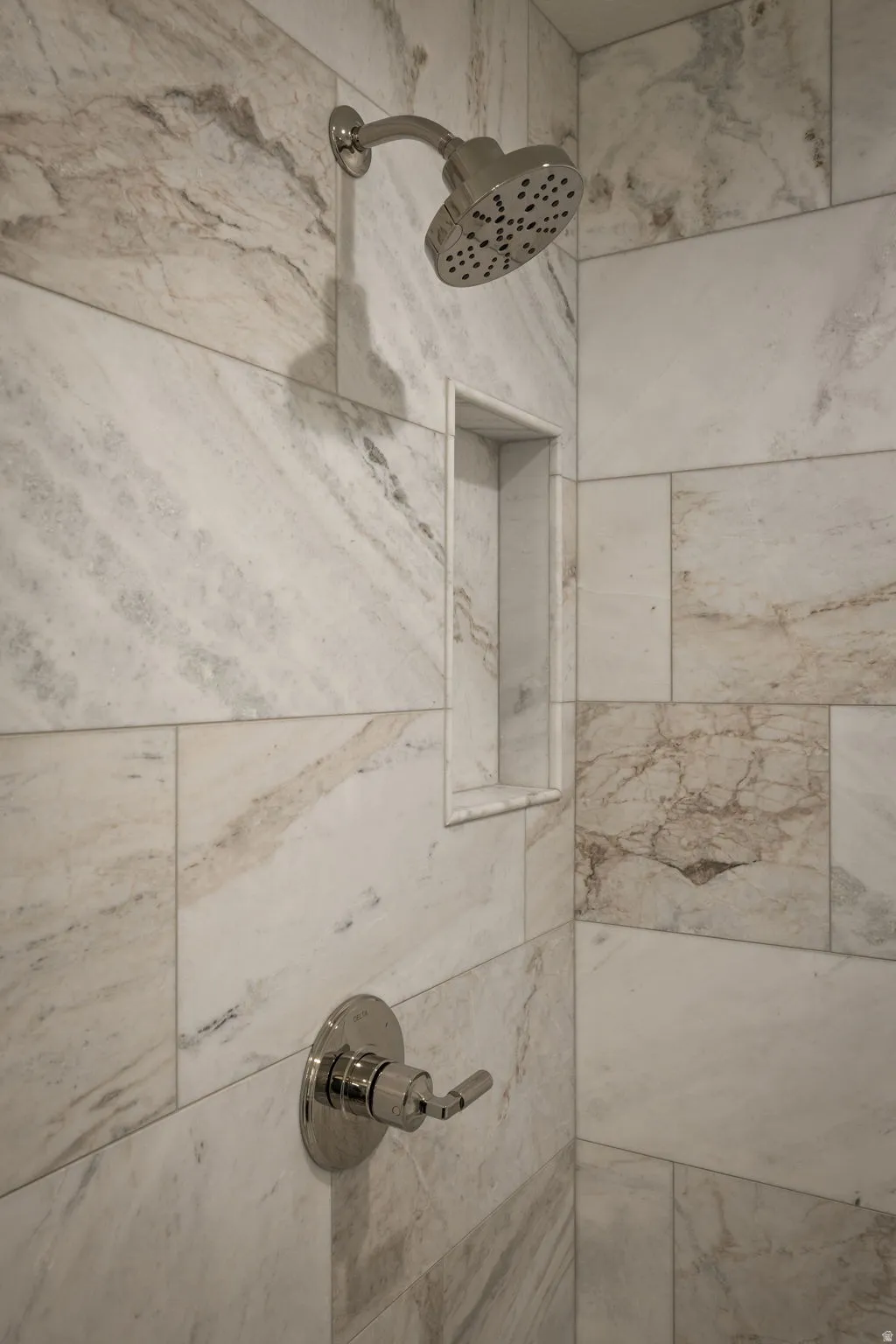 Photos of an exterior unit with the same finishes -Bathroom view of tiled shower