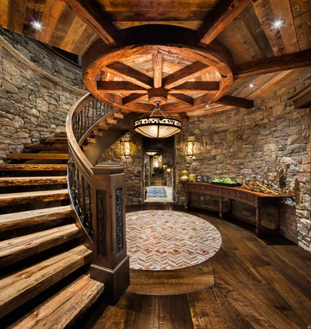 Wine room featuring dark wood-style flooring and a wooden ceiling with exposed beams