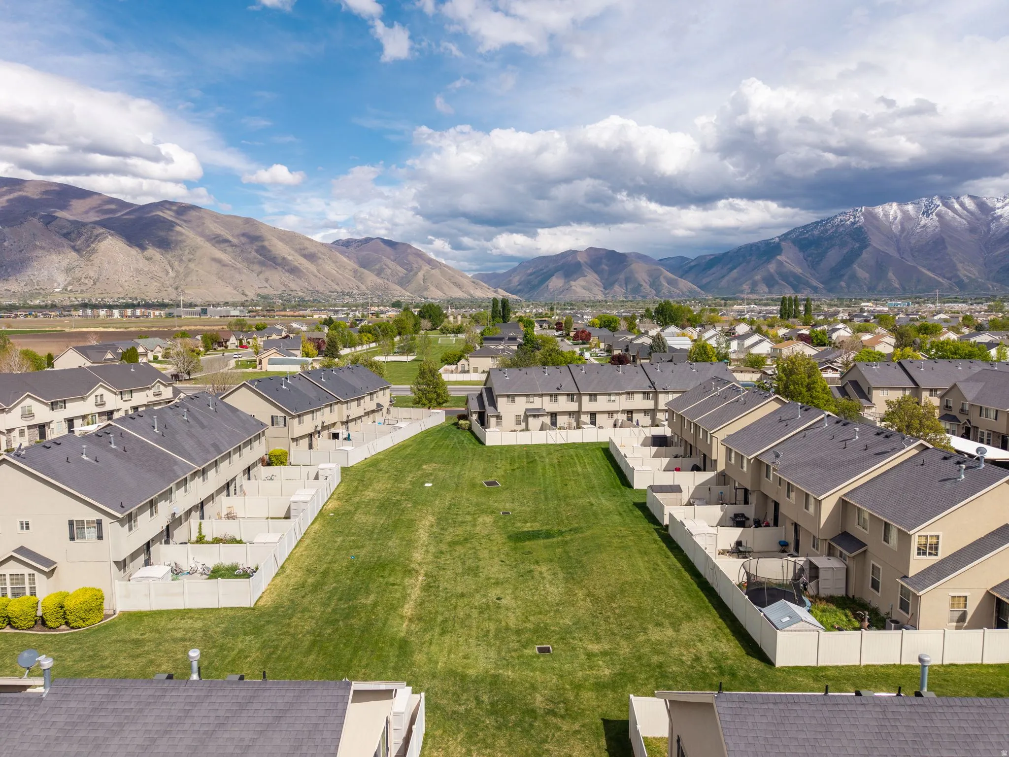 Aerial perspective of suburban area with mountains