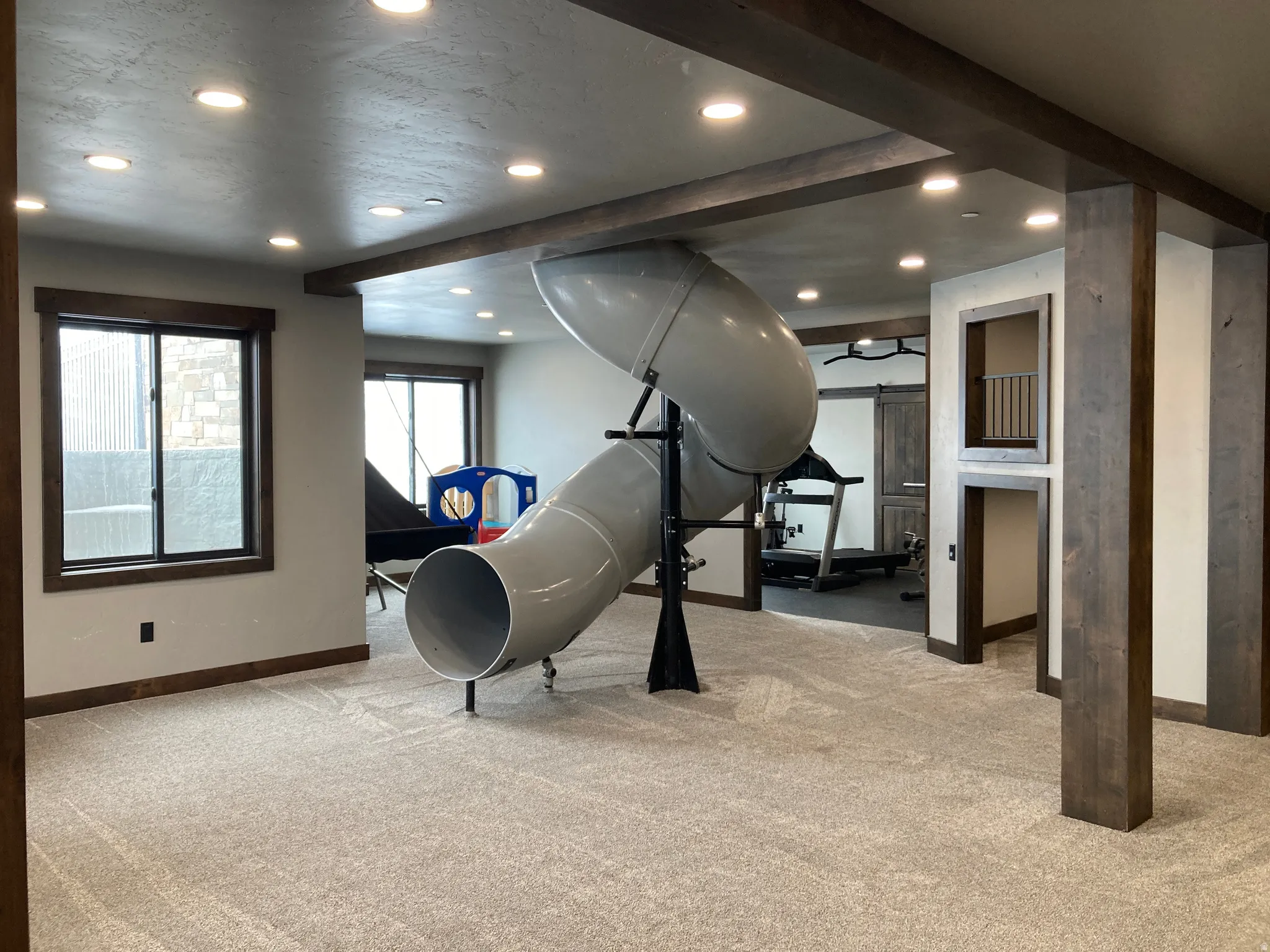 Game room featuring recessed lighting and light carpet