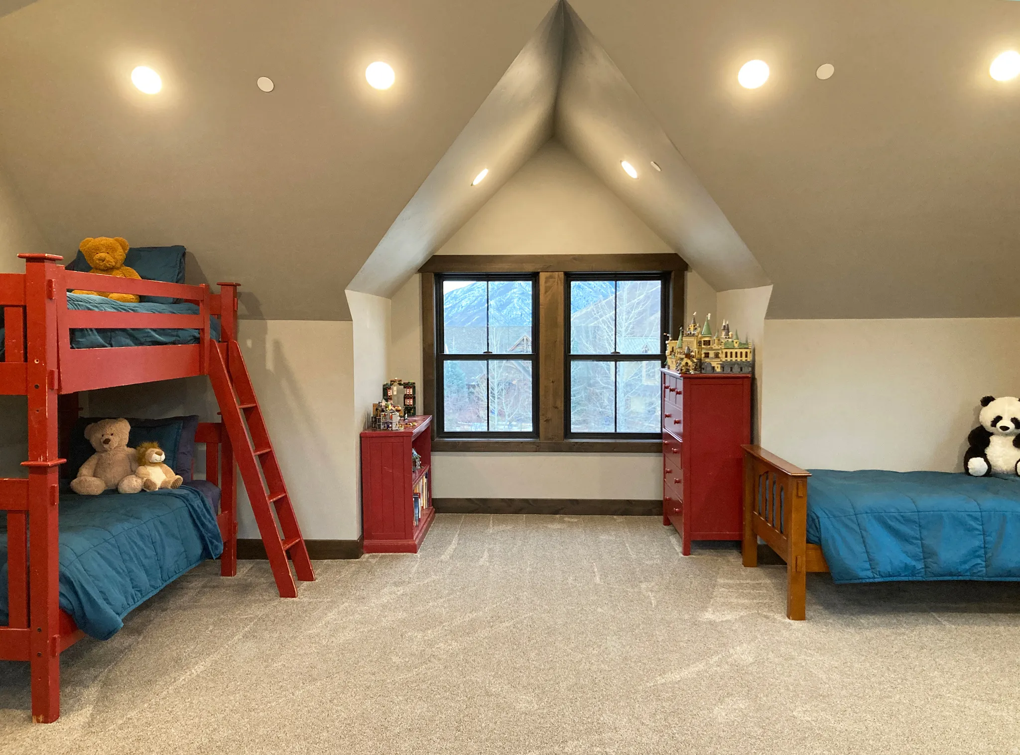 Bedroom with light colored carpet and recessed lighting