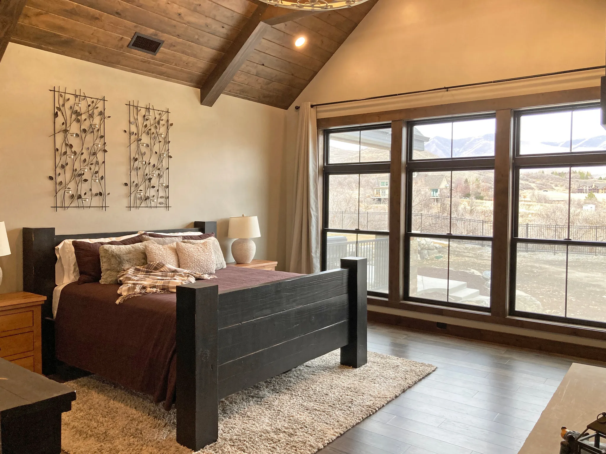 Bedroom with wooden ceiling, wood finished floors, lofted ceiling with beams, and recessed lighting